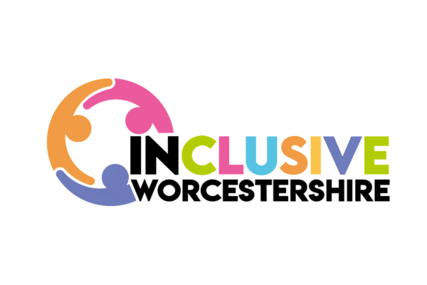 two men in building yard with hard hats, shaking hands